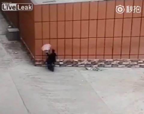 man-on-scooter-gets-face-plant-on-wall02